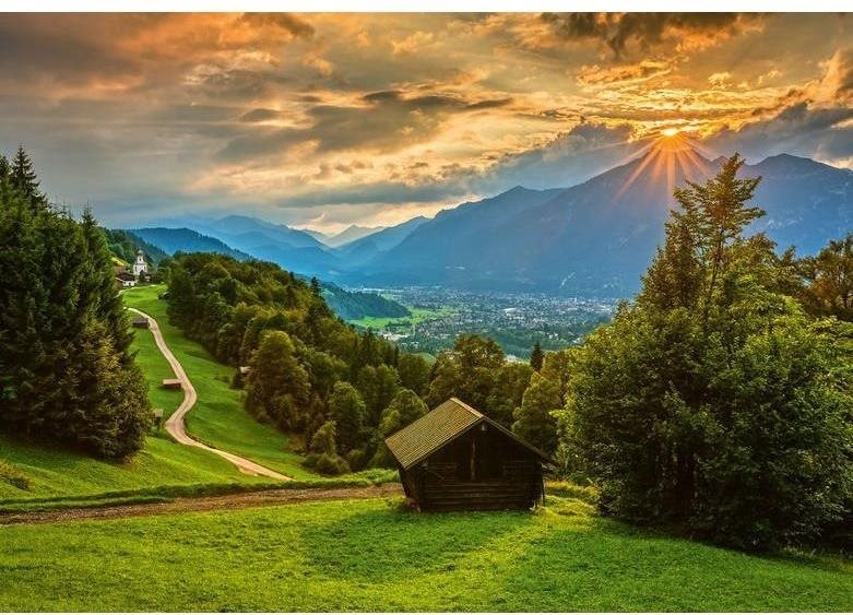 Schimdt Puzzle Západ slnka nad horskou dedinou Wamberg 1500 dielikov